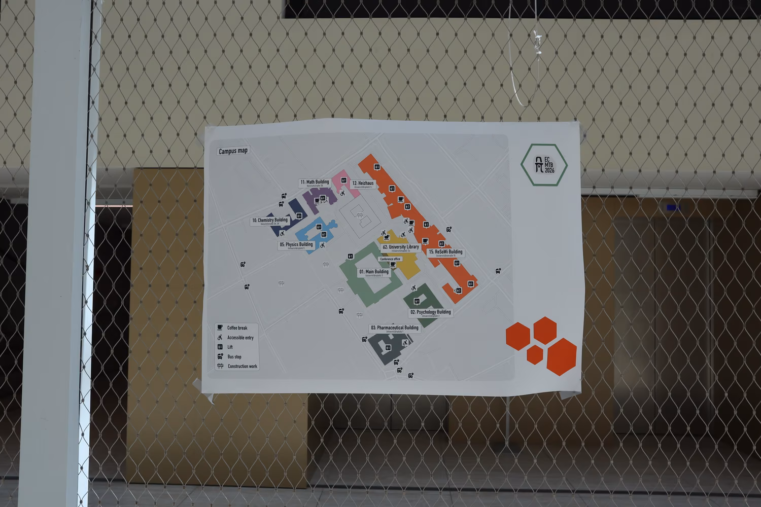 A printed out map of the university campus with labels on each different building